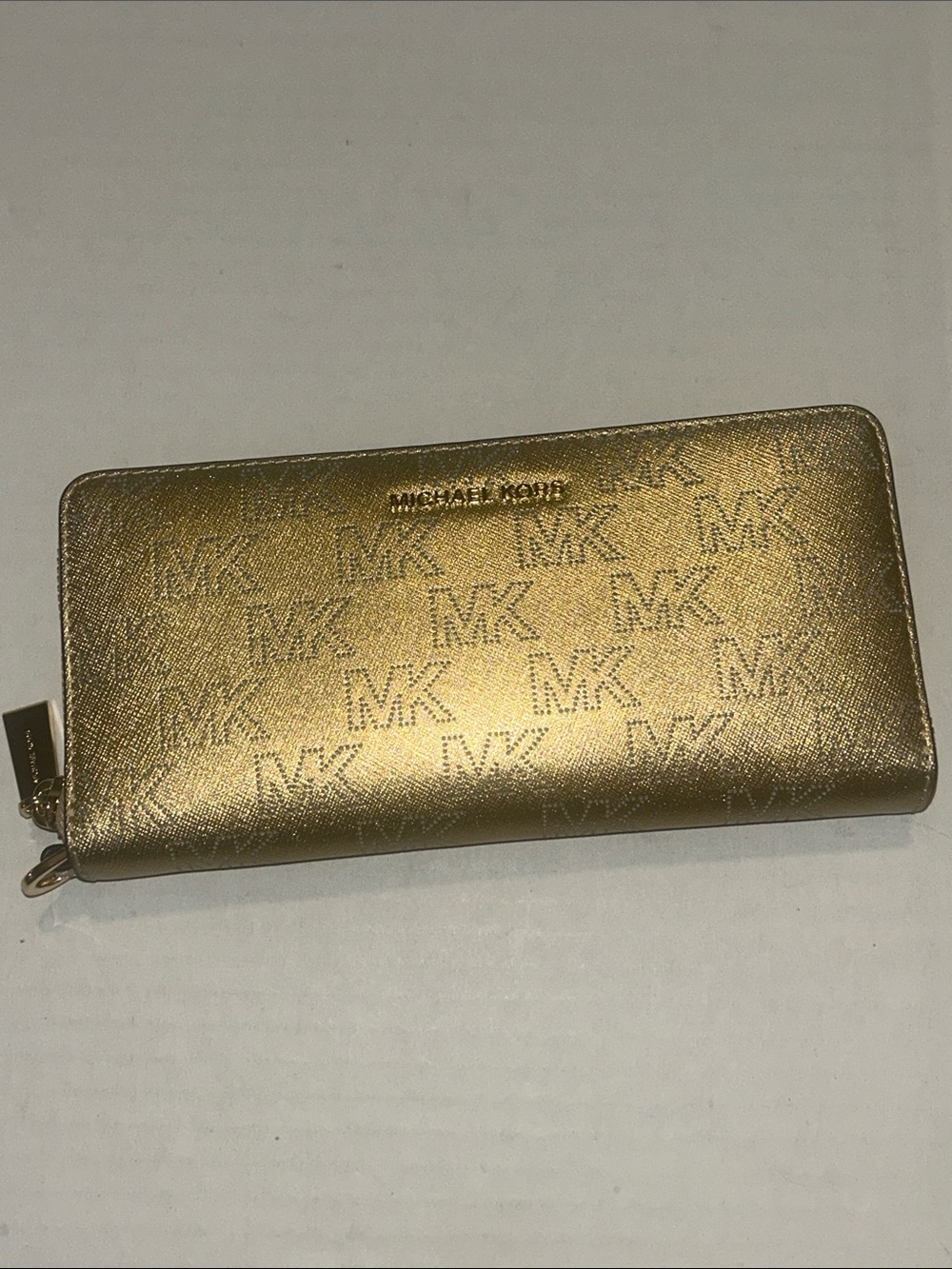 Michael Kors Gold perforated logo long zip around wallet